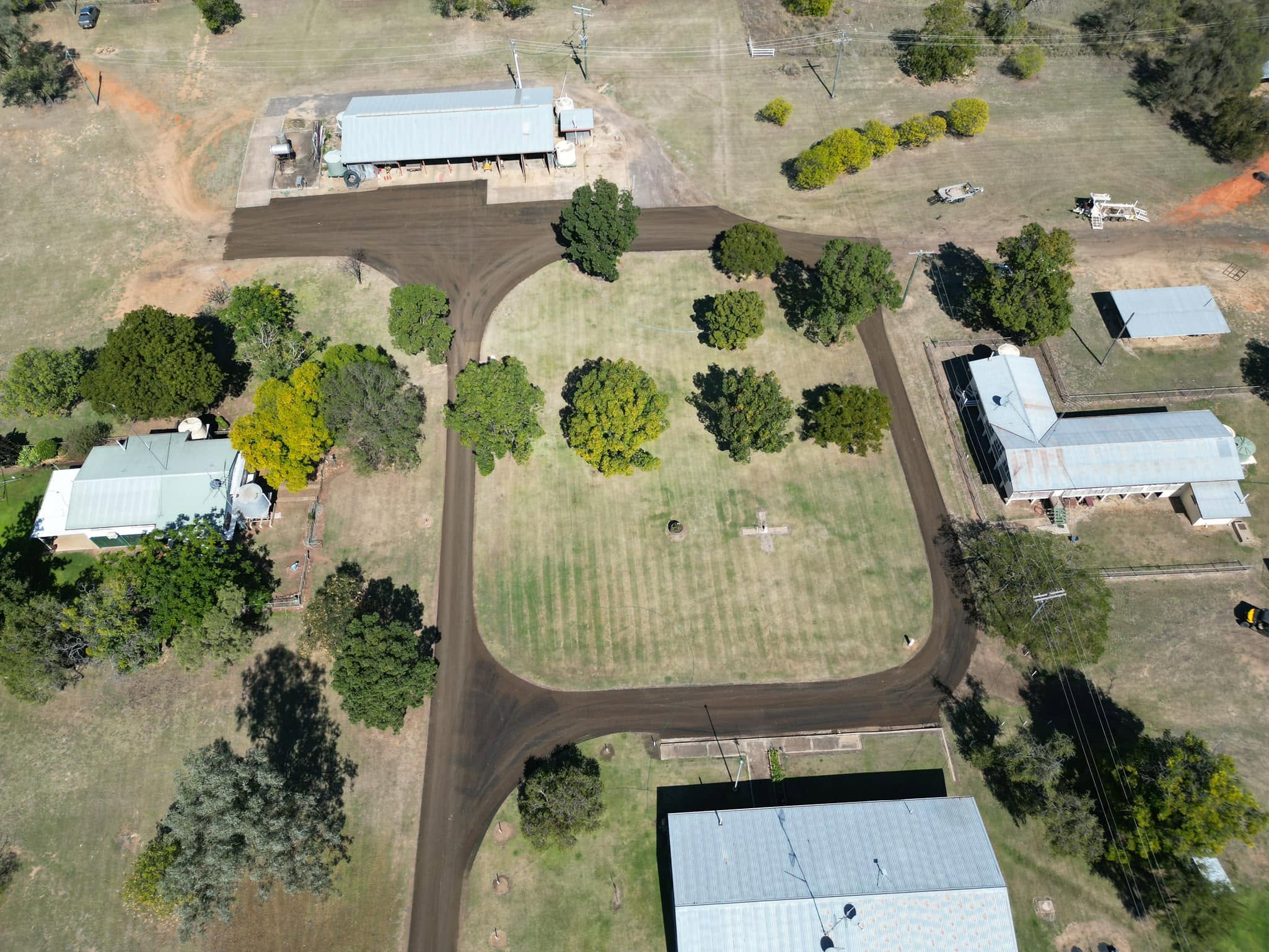 Aerial view of sealed access roads connecting rural buildings, from Road Tech Enterprises’ project gallery